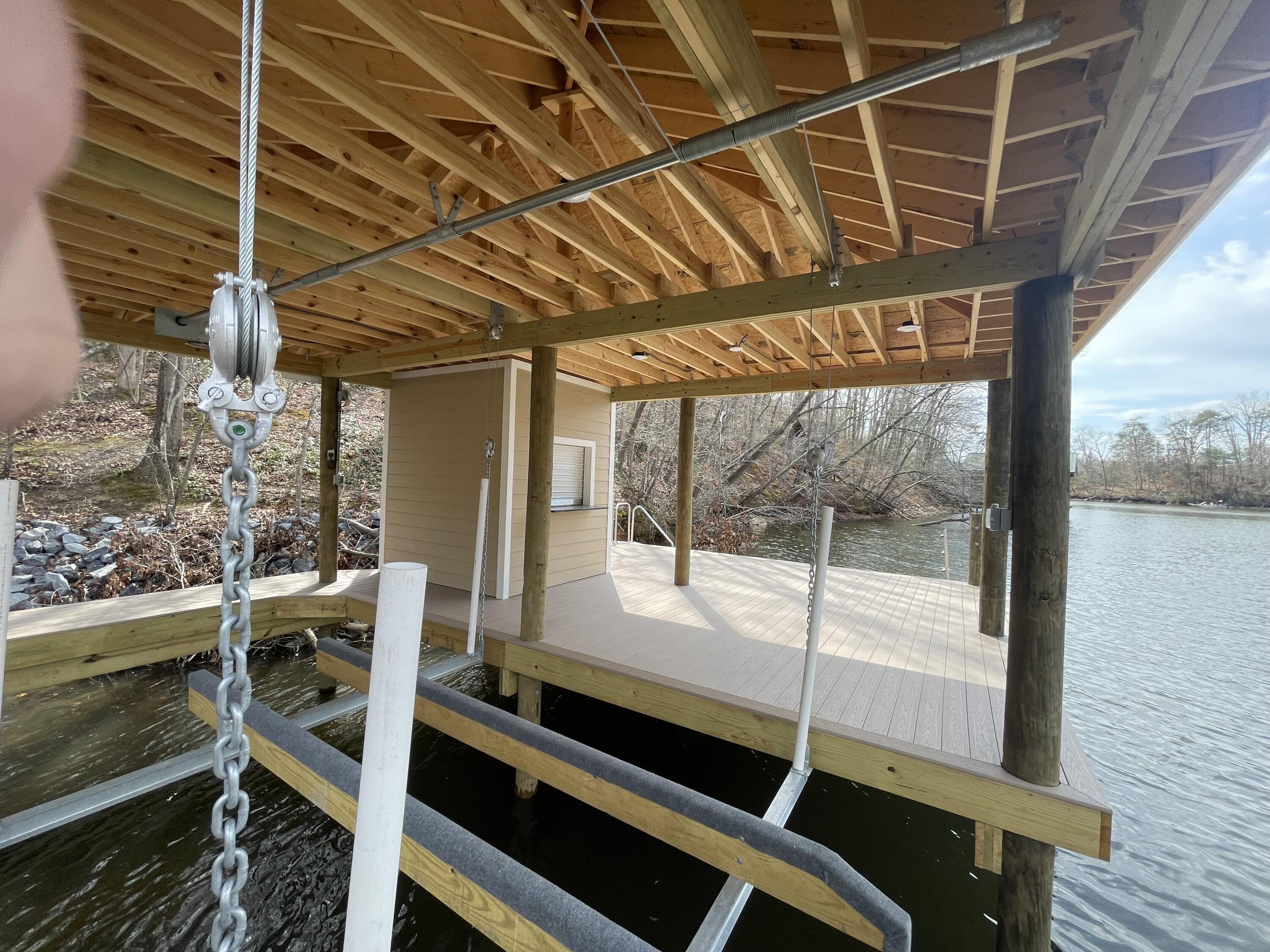 4 Lester Lane Goodview, VA 24095 - Photo 9 of 10 a view of a room with wooden stairs