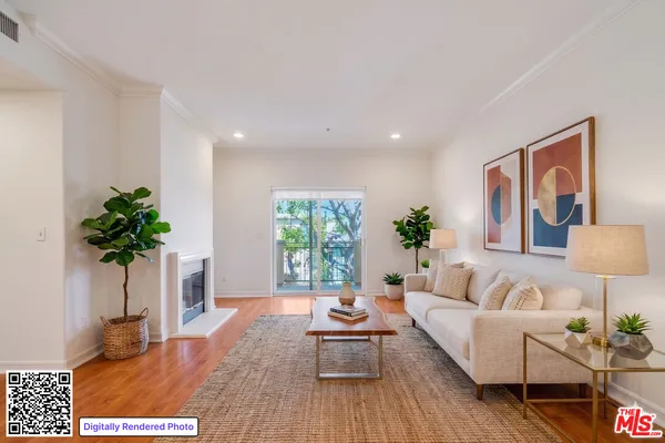 a living room with furniture potted plant and a window