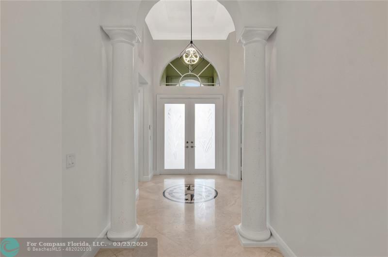 15865 Double Eagle Trail Delray Beach, FL 33446 - Photo 12 of 71 a vase of flowers sitting on a table