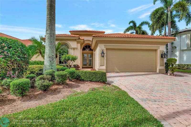 15865 Double Eagle Trail Delray Beach, FL 33446 - Photo 34 of 71 a view of a house with a yard and potted plants