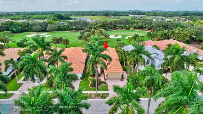 15865 Double Eagle Trail Delray Beach, FL 33446 - Photo 37 of 71 an aerial view of a house with outdoor space and a lake view