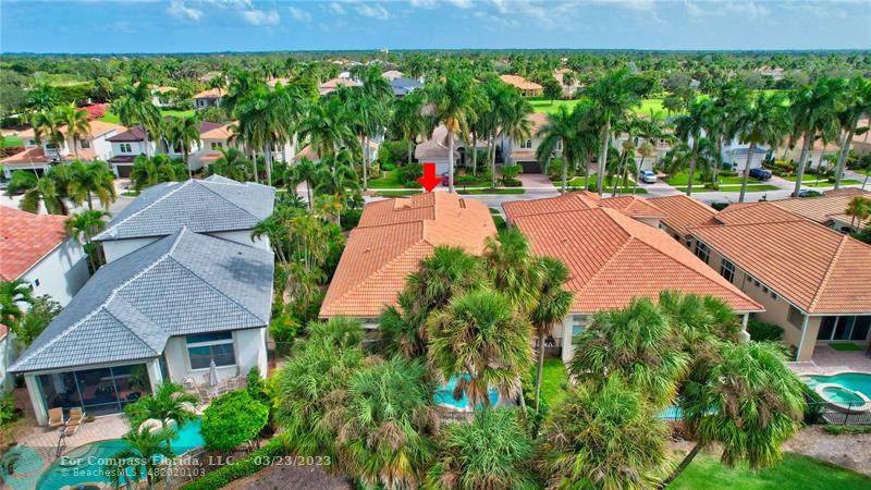 15865 Double Eagle Trail Delray Beach, FL 33446 - Photo 46 of 71 an outdoor space with seating area and trees in the background