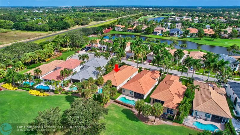 15865 Double Eagle Trail Delray Beach, FL 33446 - Photo 49 of 71 an aerial view of residential houses with outdoor space and trees