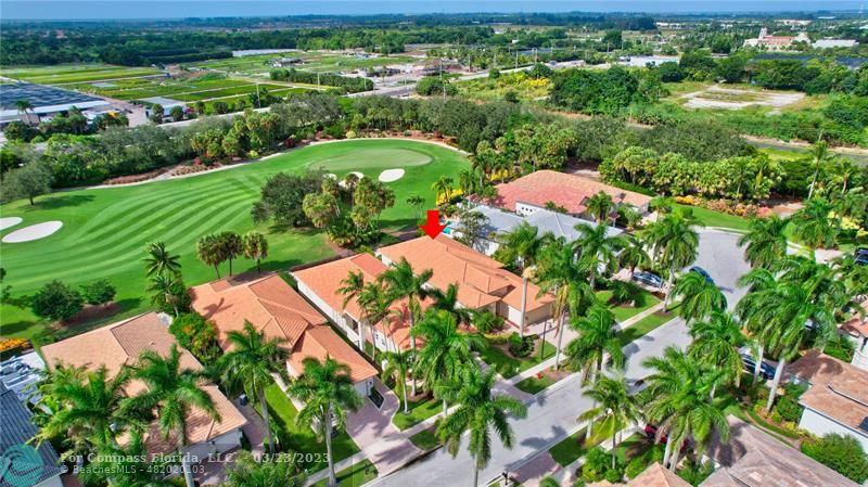 15865 Double Eagle Trail Delray Beach, FL 33446 - Photo 52 of 71 an aerial view of a golf course with parking space