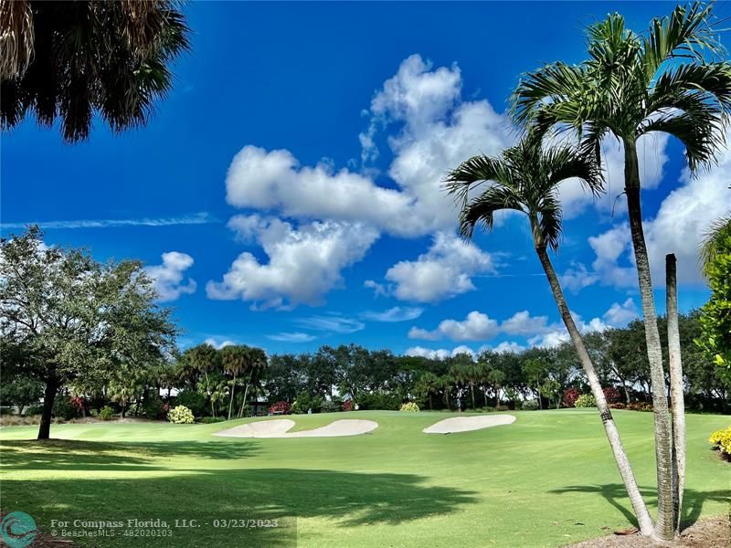 15865 Double Eagle Trail Delray Beach, FL 33446 - Photo 58 of 71 a view of a golf course with a garden