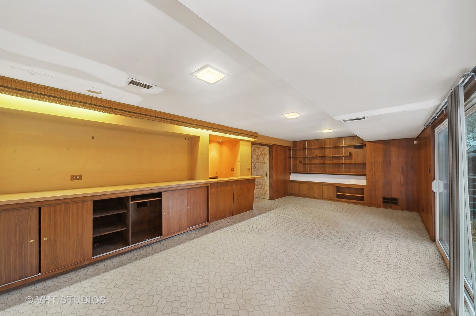 3910 White Cloud Drive Skokie, IL 60076 - Photo 6 of 23 a view of an empty room with a fireplace