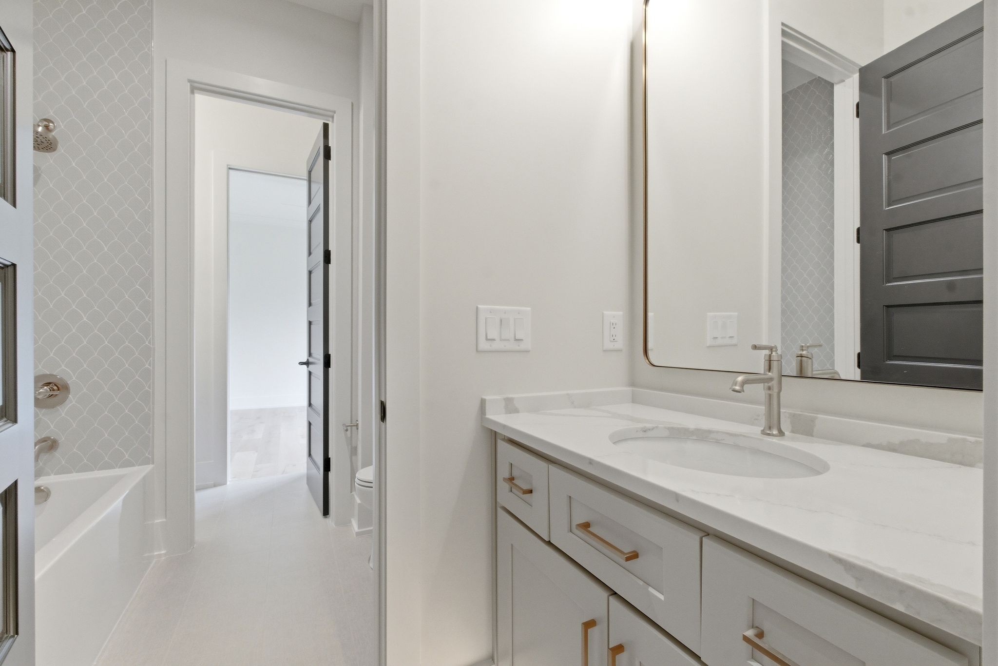 1002 Waller Road Brentwood, TN 37027 - Photo 38 of 54 a bathroom with a sink and a mirror