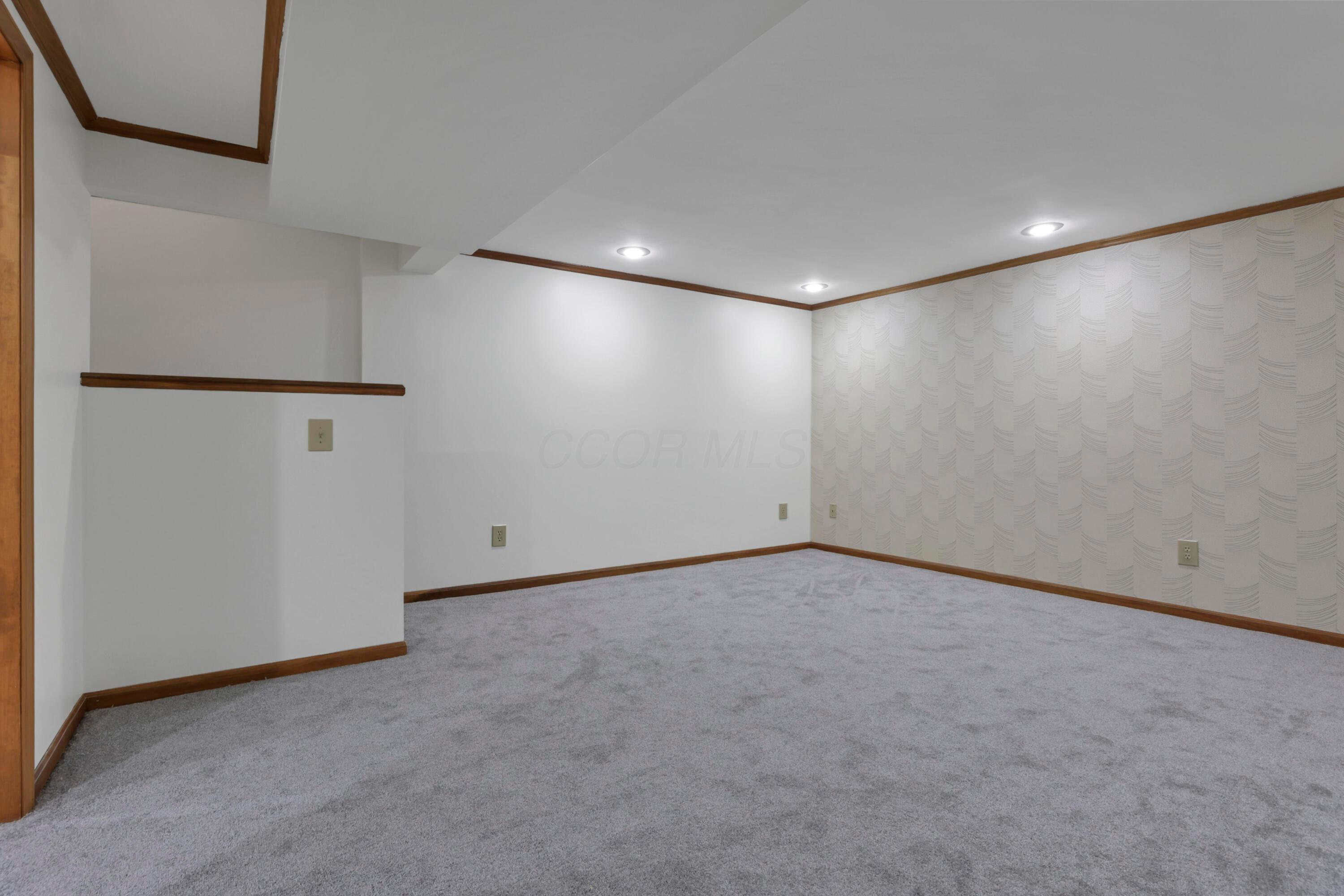 6451 Faircrest Road Columbus, OH 43229 - Photo 12 of 20 Lower Level Rec Room 1