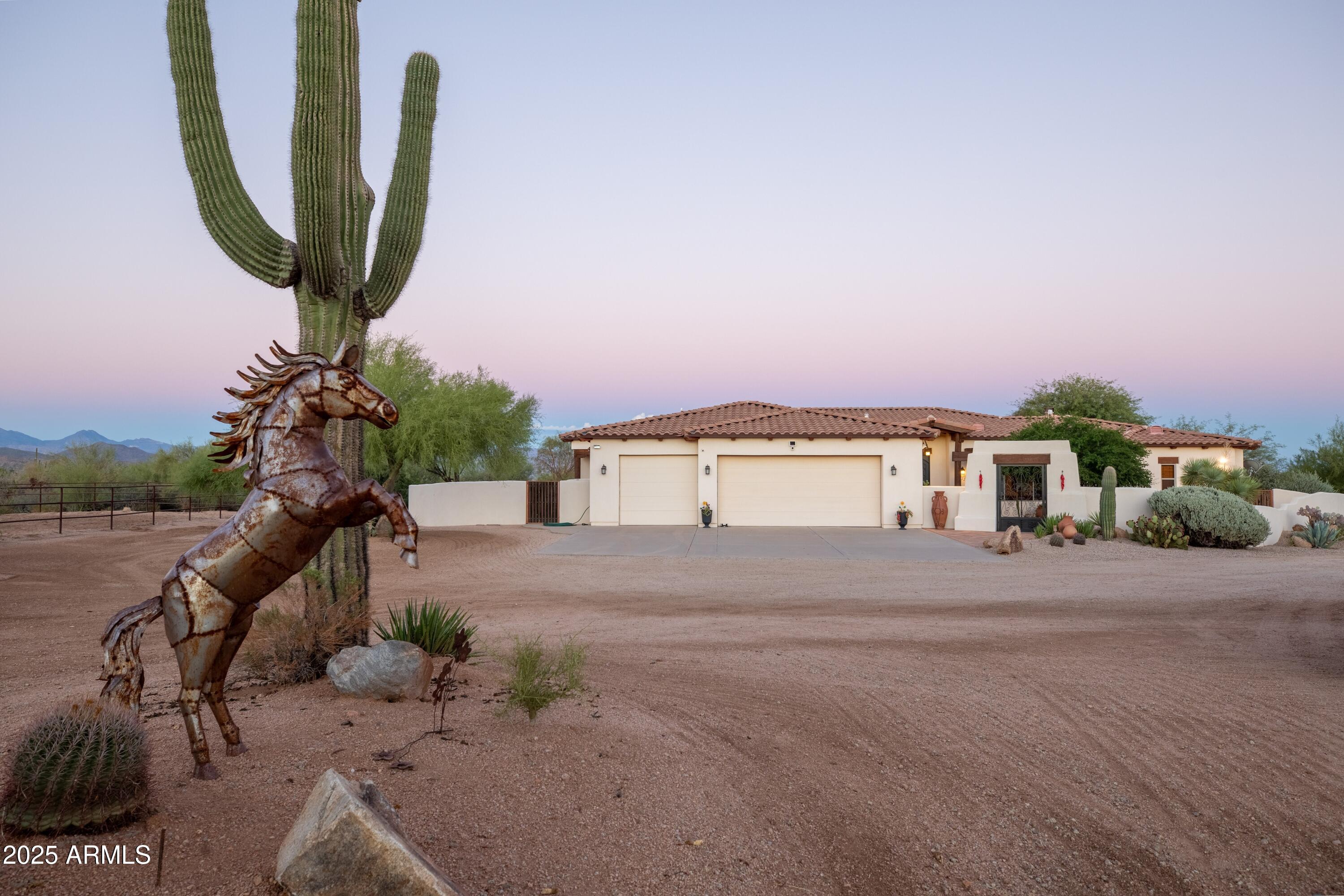 14224 East Rockview Road Scottsdale, AZ 85262 - Photo 13 of 118 a front view of a house with a yard and garage