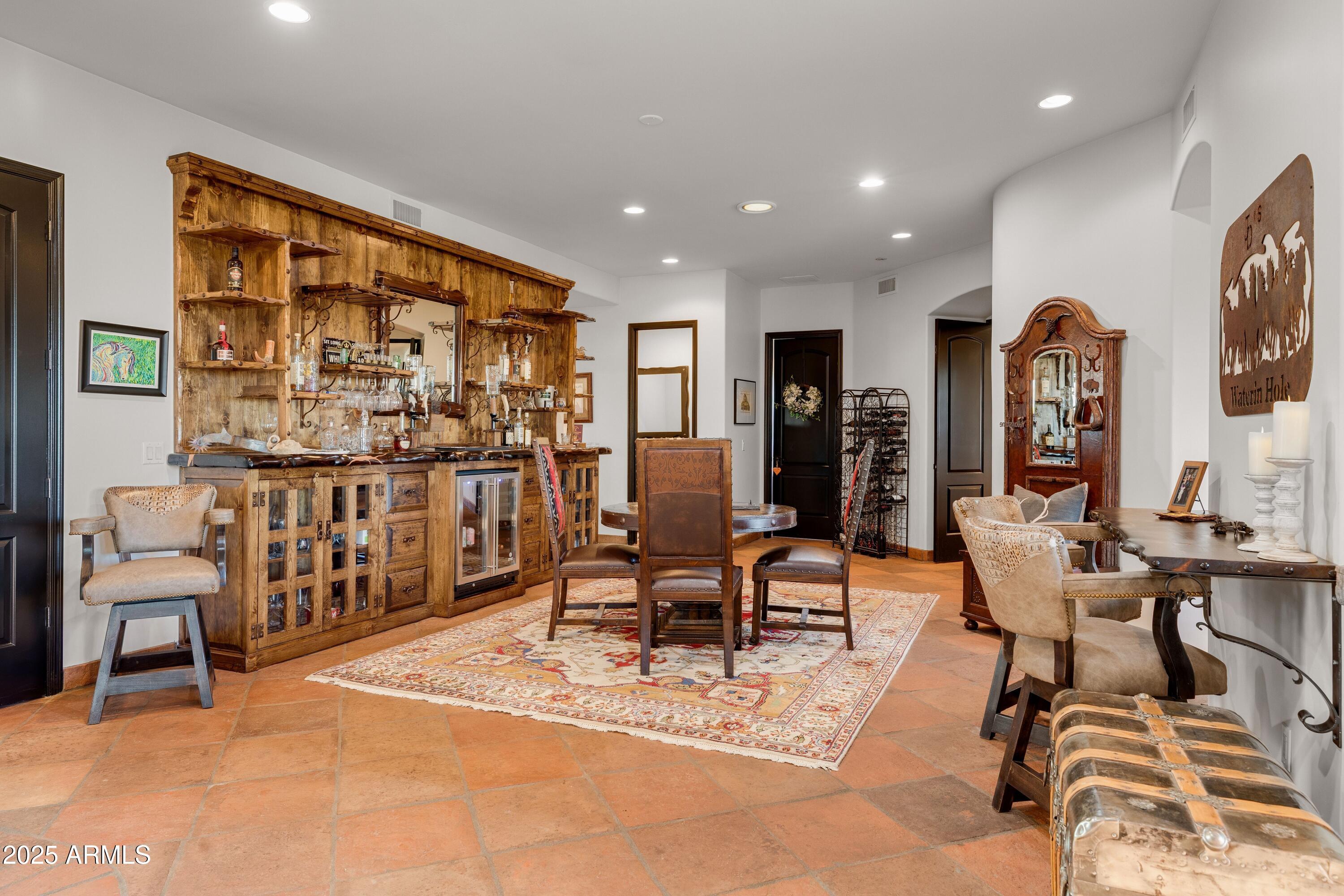 14224 East Rockview Road Scottsdale, AZ 85262 - Photo 19 of 118 a living room with furniture a rug and a large window