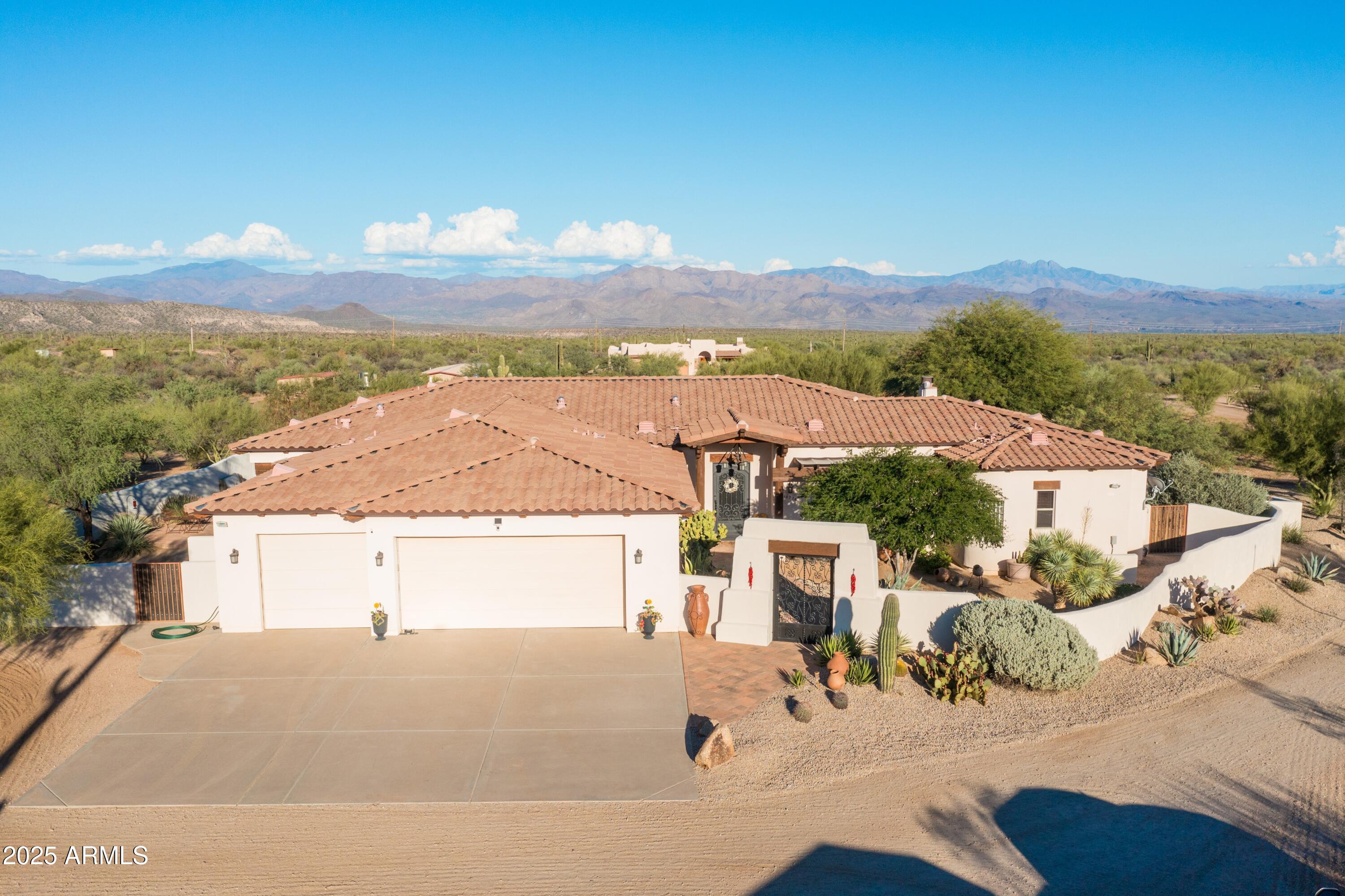 14224 East Rockview Road Scottsdale, AZ 85262 - Photo 2 of 118 a view of a house with a yard and mountain view