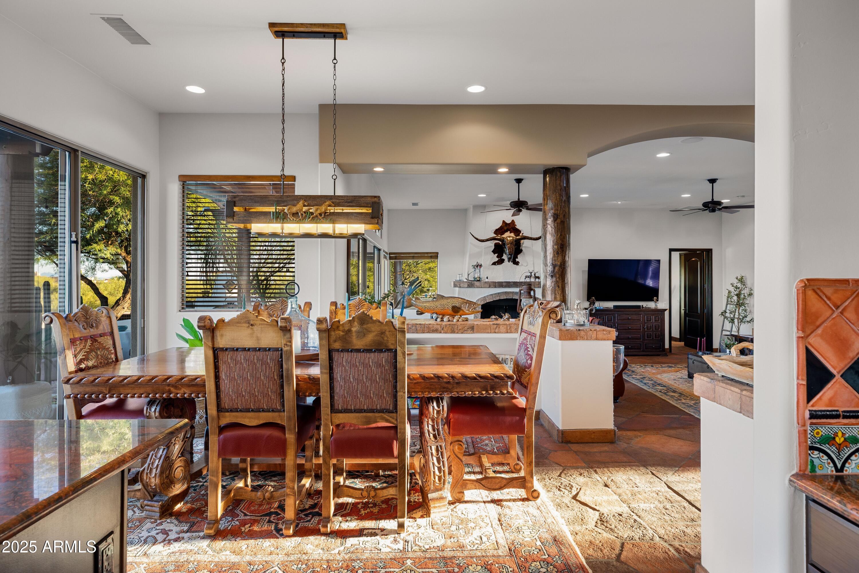 14224 East Rockview Road Scottsdale, AZ 85262 - Photo 24 of 118 a view of a dining room with furniture window and outside view