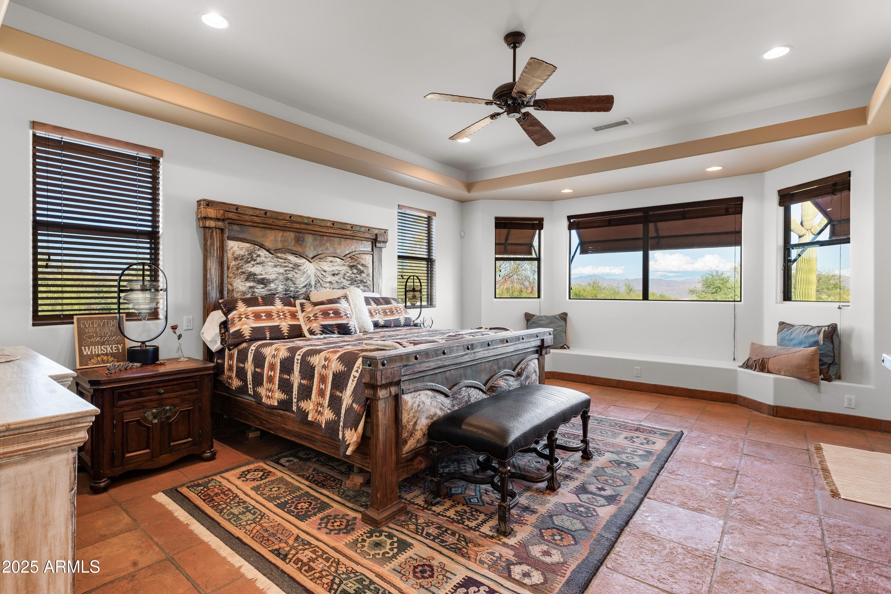 14224 East Rockview Road Scottsdale, AZ 85262 - Photo 31 of 118 a bed room with a bed and a couch