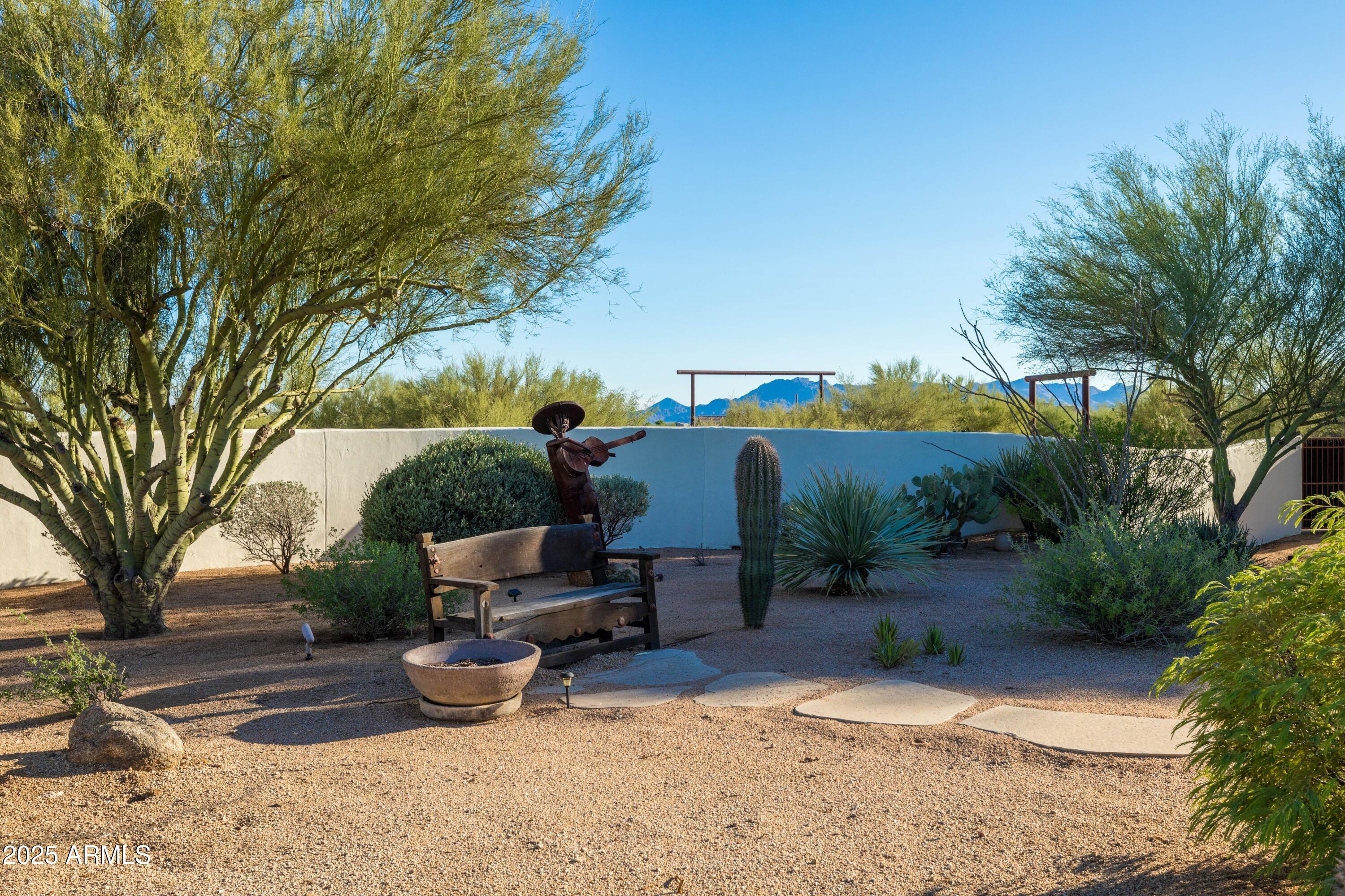 14224 East Rockview Road Scottsdale, AZ 85262 - Photo 63 of 118 a view of a backyard with furniture and plants