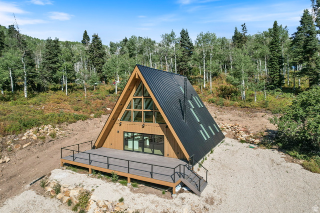 1833 Pine Loop Road Coalville, UT 84017 - Photo 19 of 26 A-frame architecture featuring a dark metal roof and light wood siding