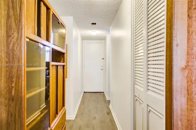 a view of gallery with windows