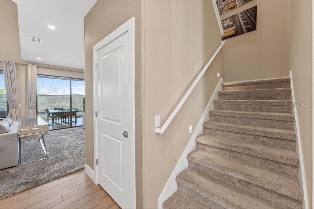3119 Rockefeller Way Kissimmee, FL 34747 - Photo 17 of 57 a view of entryway and hall with wooden floor