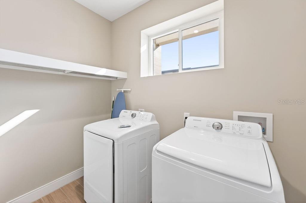 3119 Rockefeller Way Kissimmee, FL 34747 - Photo 39 of 57 a utility room with dryer and washer