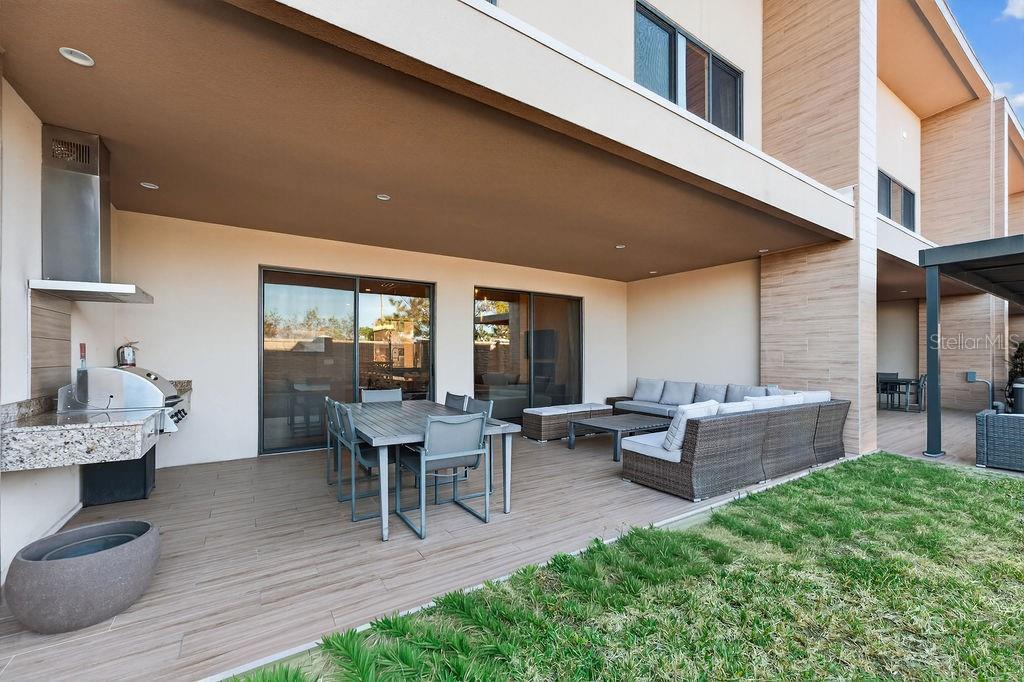 3119 Rockefeller Way Kissimmee, FL 34747 - Photo 42 of 57 a view of a patio with couches table and chairs