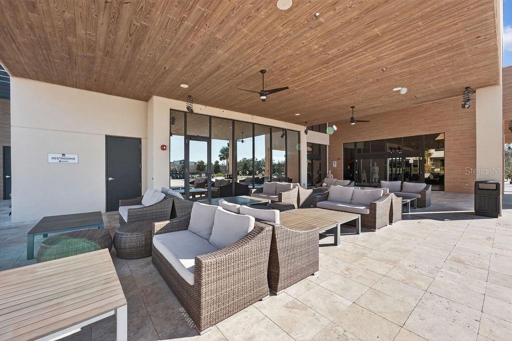 3119 Rockefeller Way Kissimmee, FL 34747 - Photo 55 of 57 a living room with lots of furniture and a potted plant
