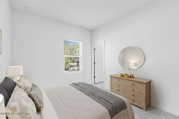 an empty room with a bathroom