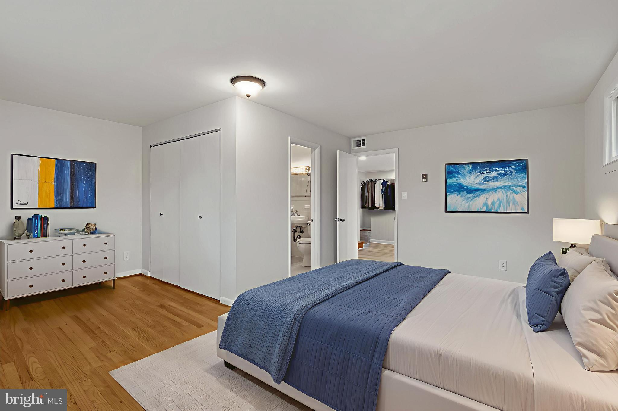 302 Wessling Circle Baltimore, MD 21228 - Photo 12 of 41 a bedroom with a bed and a dresser