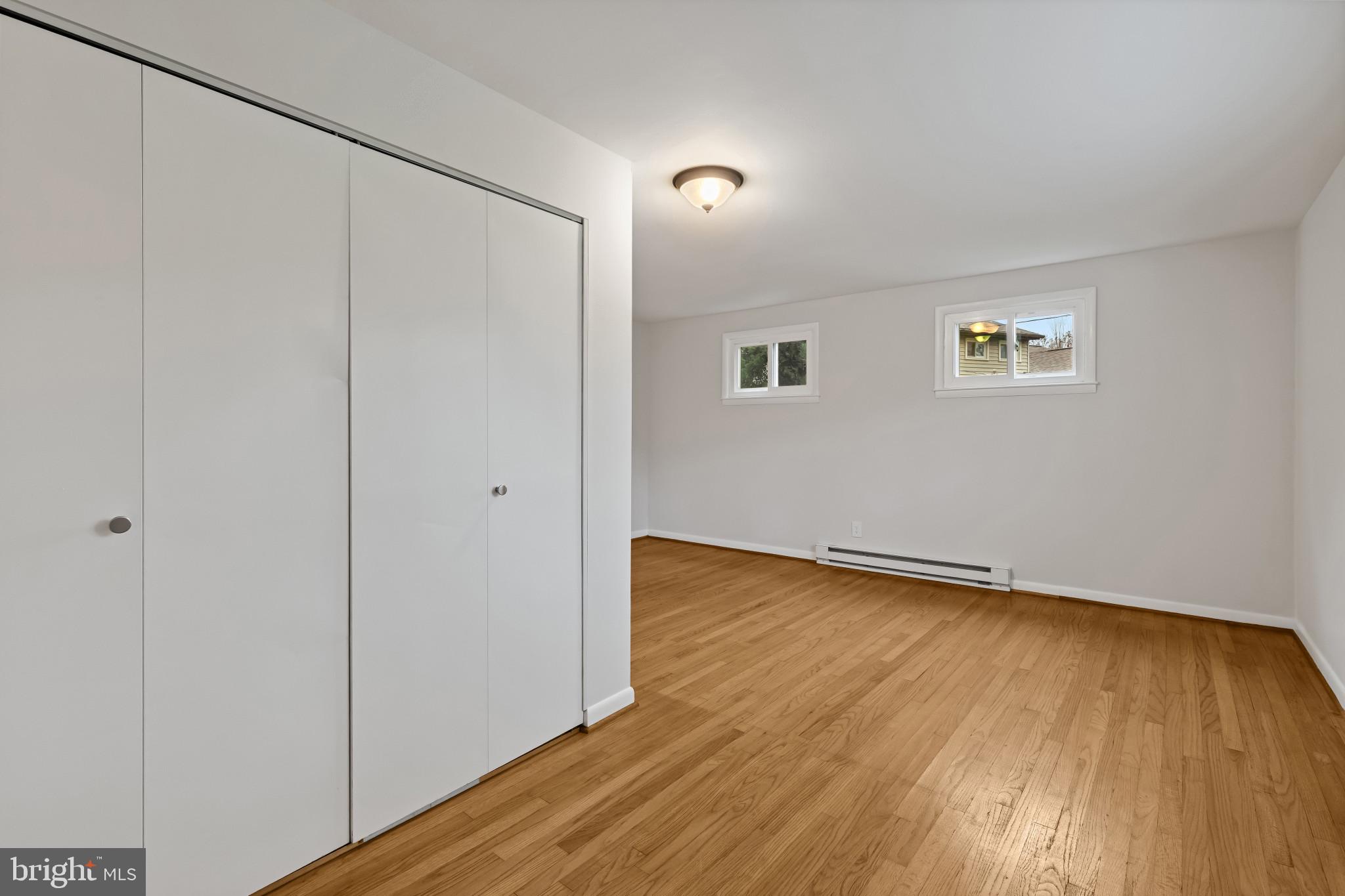 302 Wessling Circle Baltimore, MD 21228 - Photo 13 of 41 a view of a room with wooden floor