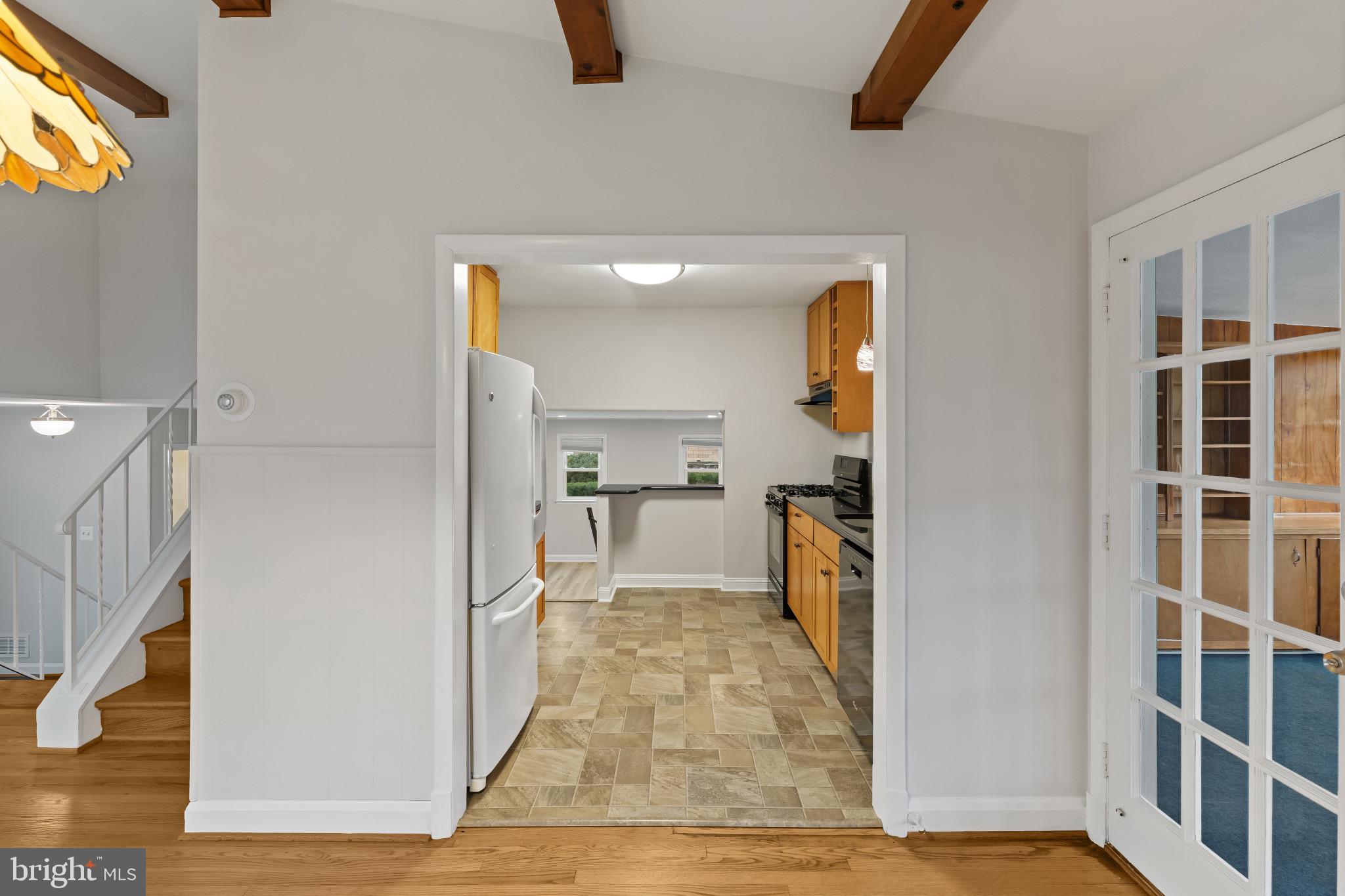 302 Wessling Circle Baltimore, MD 21228 - Photo 17 of 41 a view of a kitchen from the hallway