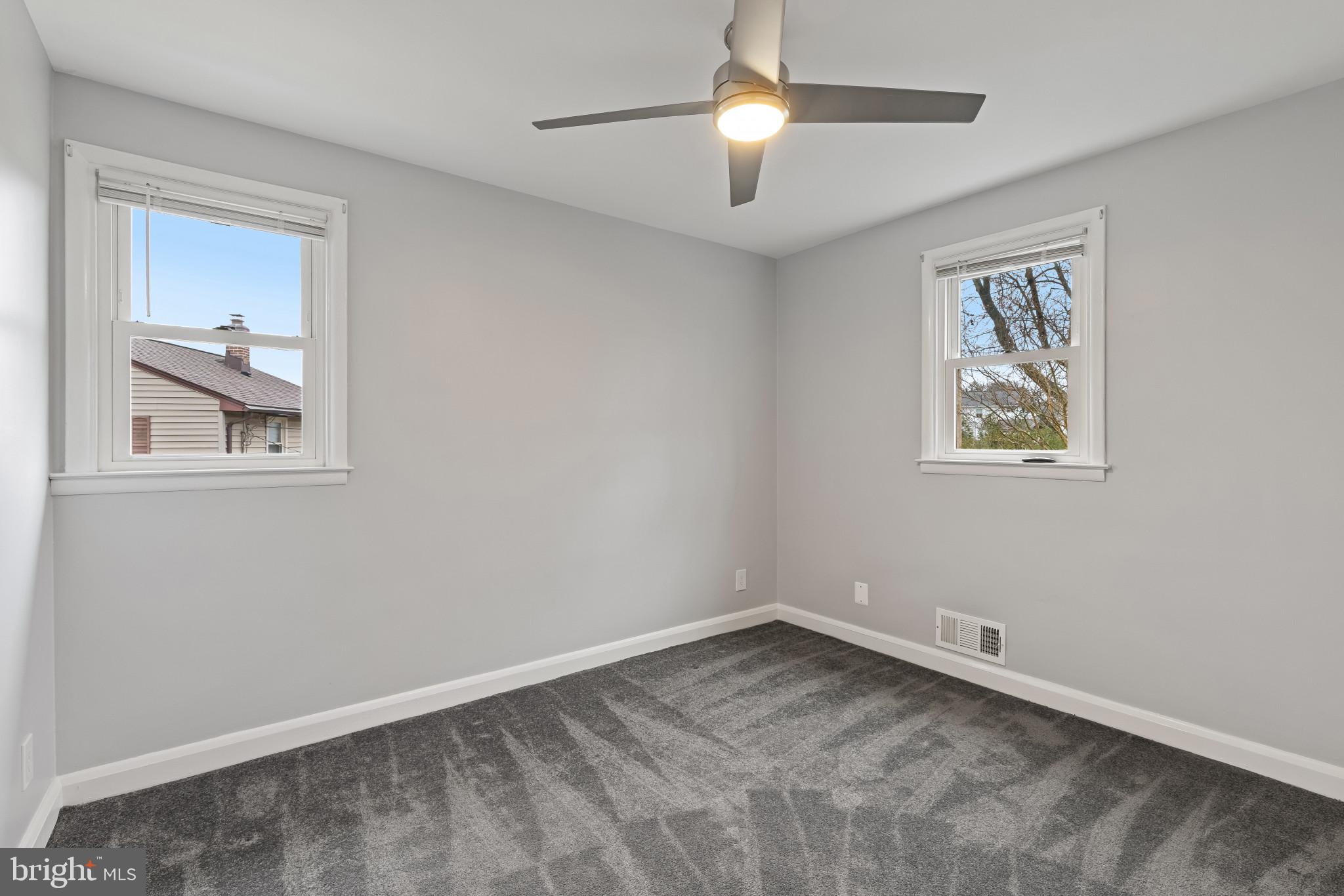 302 Wessling Circle Baltimore, MD 21228 - Photo 22 of 41 a view of an empty room with a window