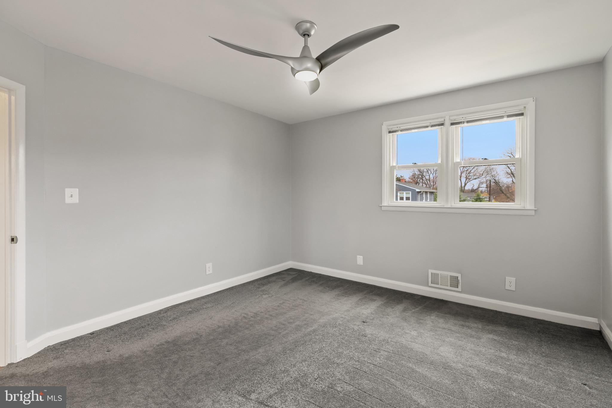 302 Wessling Circle Baltimore, MD 21228 - Photo 26 of 41 an empty room with a fan