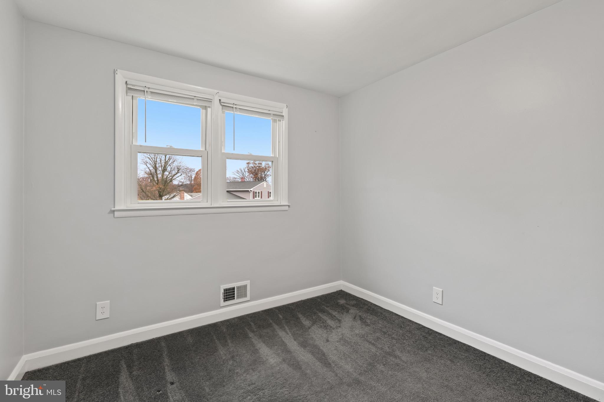 302 Wessling Circle Baltimore, MD 21228 - Photo 28 of 41 a view of empty room with window