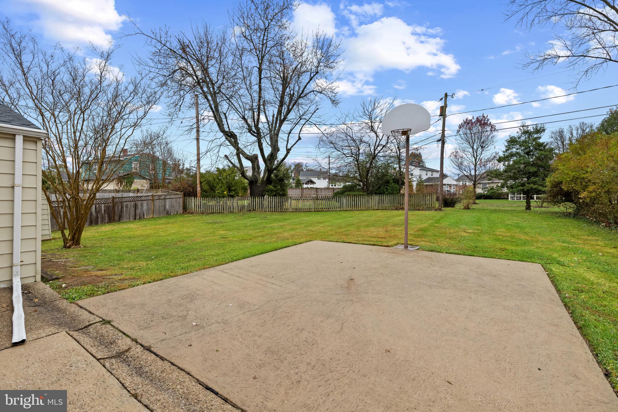 302 Wessling Circle Baltimore, MD 21228 - Photo 35 of 41 a view of a park with large trees