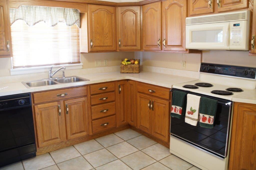 118 Shafer Road Coraopolis, PA 15108 - Photo 7 of 25 Oak kitchen with dishwasher, el. stove & microwave.