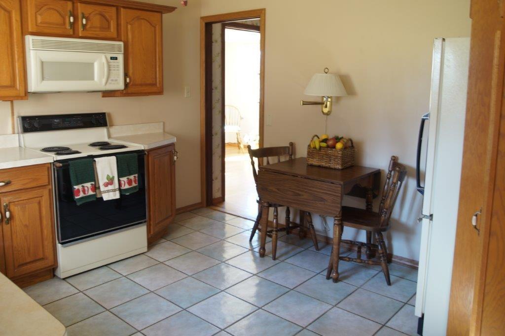118 Shafer Road Coraopolis, PA 15108 - Photo 8 of 25 Kitchen showing eating area & ceramic tile floor.