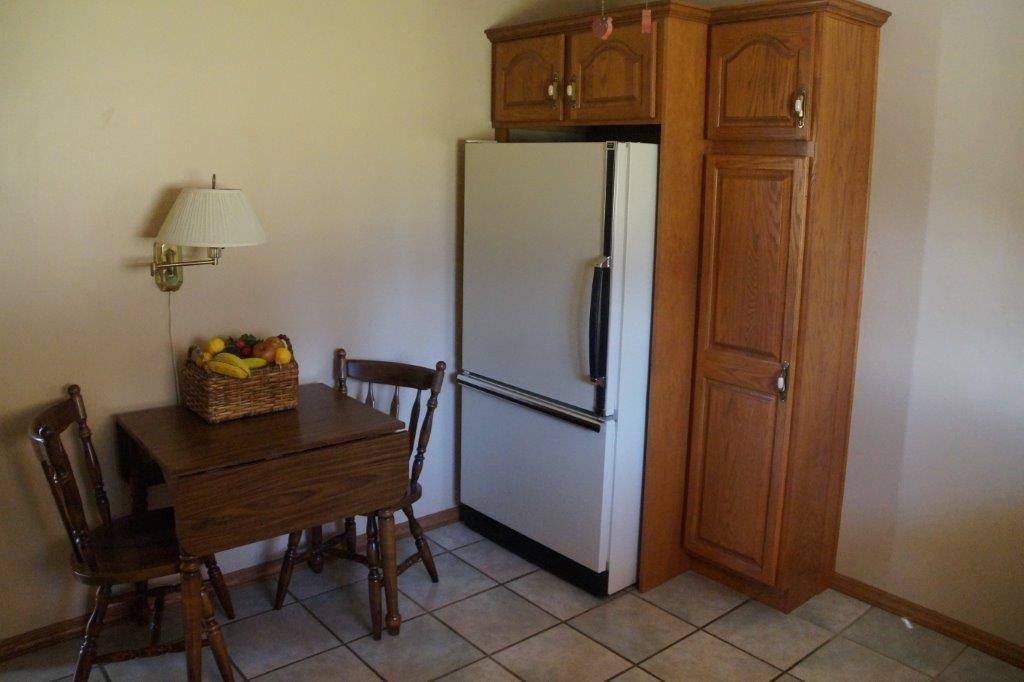 118 Shafer Road Coraopolis, PA 15108 - Photo 9 of 25 Kitchen showing refrigerator & pantry closet.