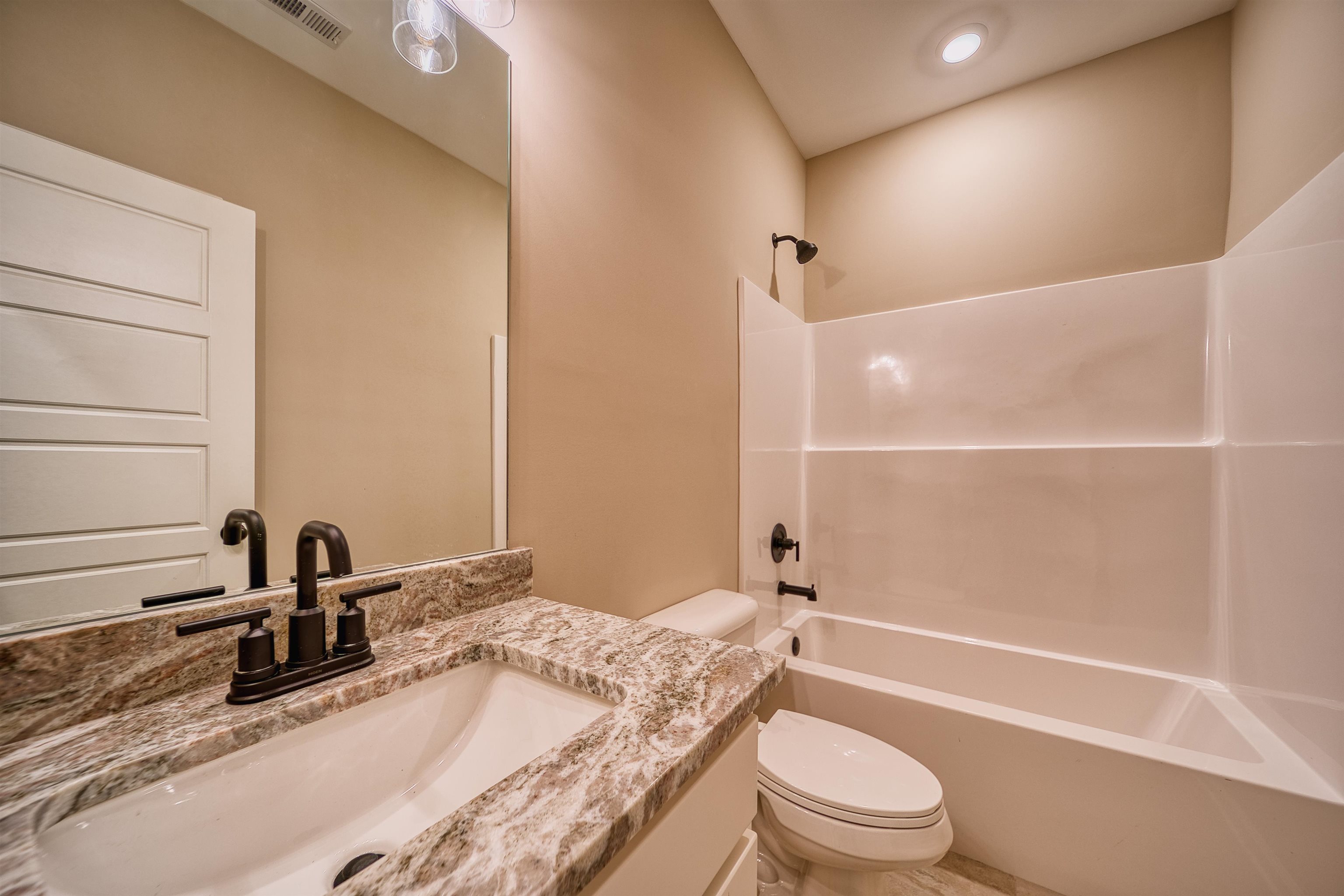 19 Columbia Way Atoka, TN 38004 - Photo 22 of 40 Full bath featuring vanity and bathtub / shower combination