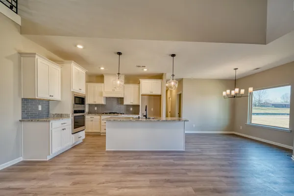 a view of a house with a big yard