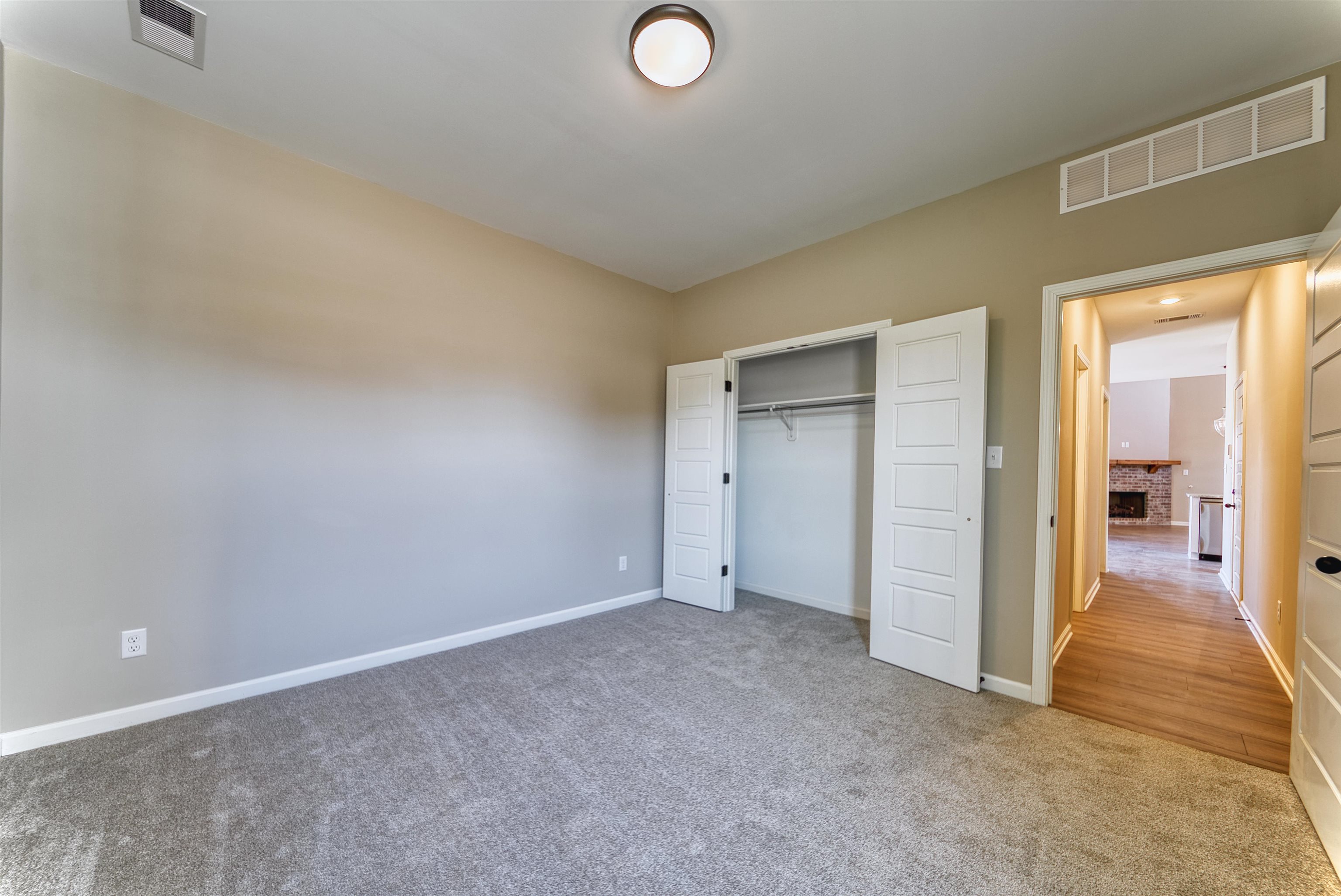 19 Columbia Way Atoka, TN 38004 - Photo 23 of 40 Unfurnished bedroom with carpet flooring and a closet