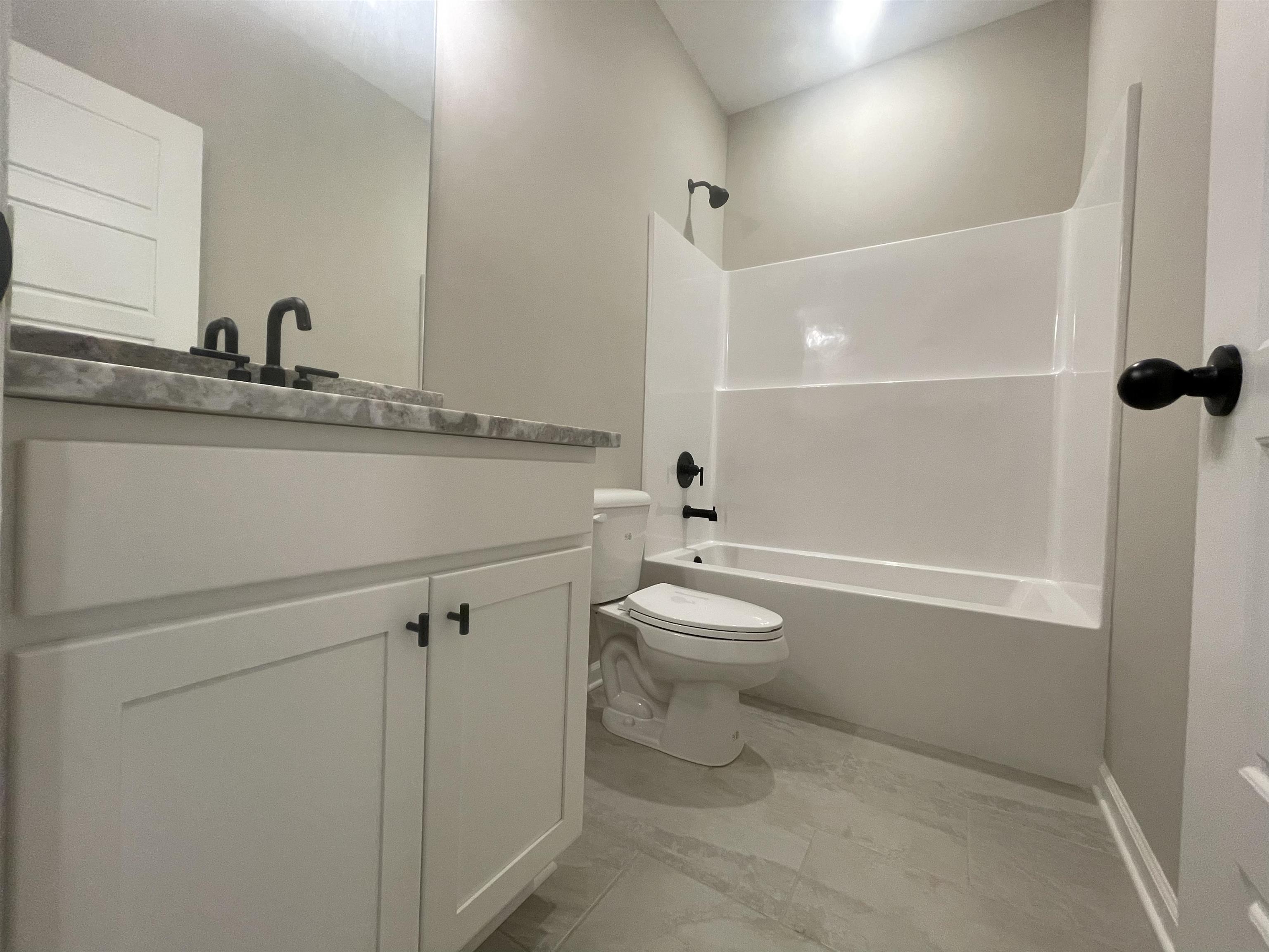 19 Columbia Way Atoka, TN 38004 - Photo 23 of 28 Bathroom with shower / bath combination and vanity