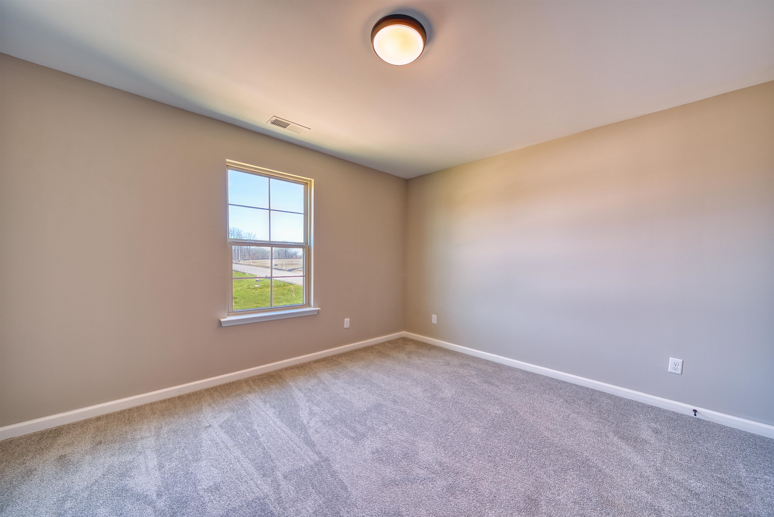19 Columbia Way Atoka, TN 38004 - Photo 25 of 40 Spare room with baseboards and light carpet