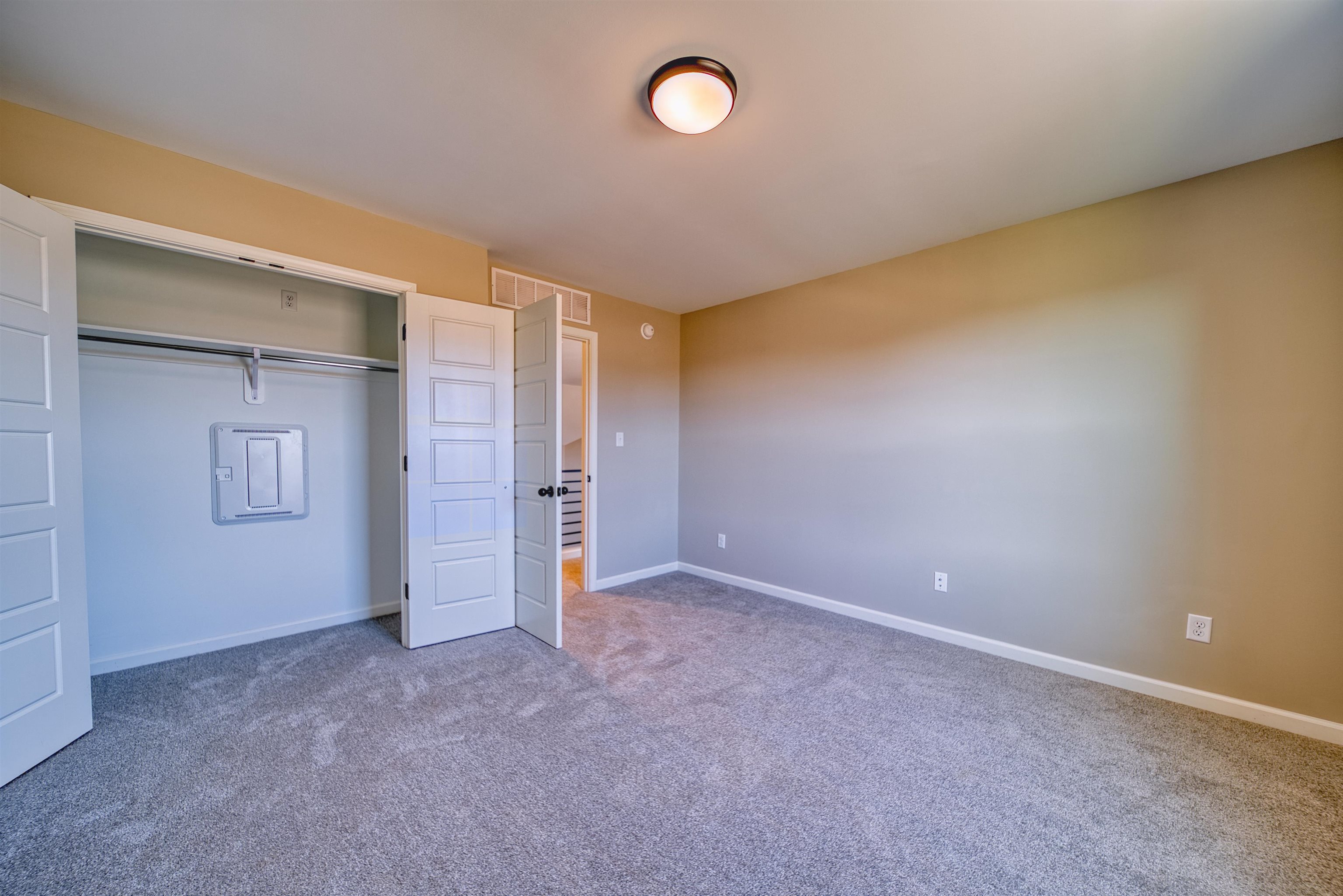 19 Columbia Way Atoka, TN 38004 - Photo 27 of 40 Unfurnished bedroom with carpet flooring and a closet