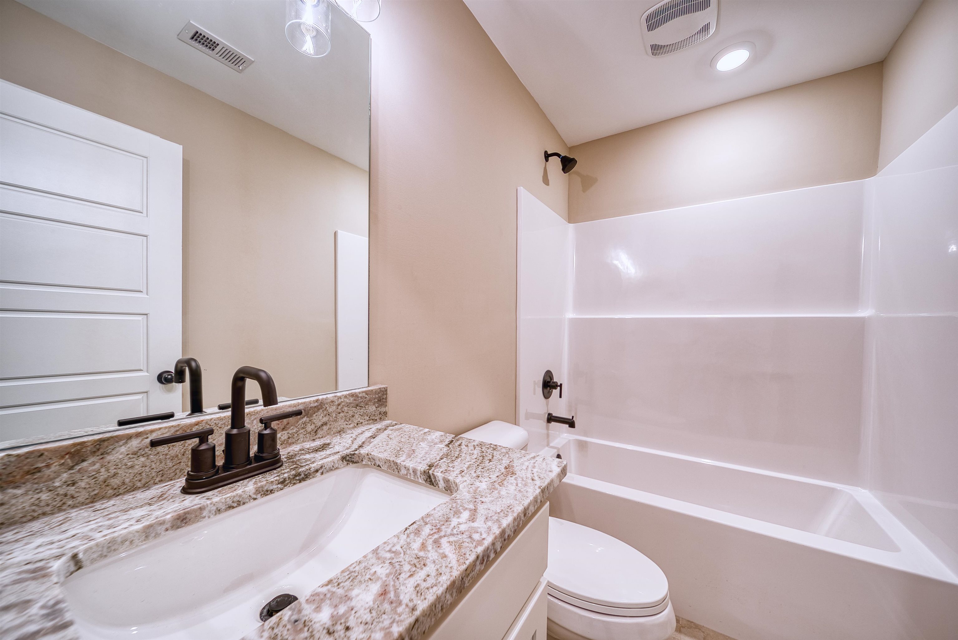 19 Columbia Way Atoka, TN 38004 - Photo 28 of 40 Full bathroom with vanity and bathtub / shower combination