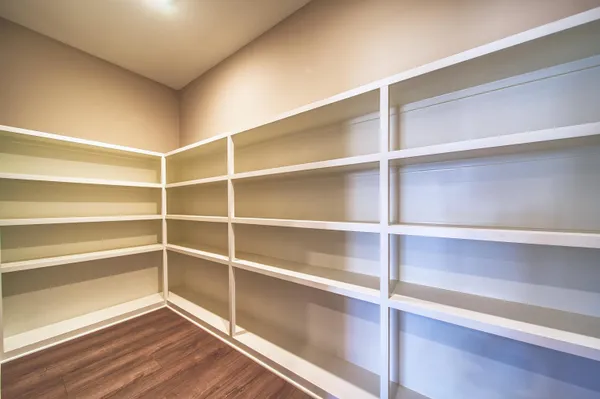a bathroom with a tub and shower