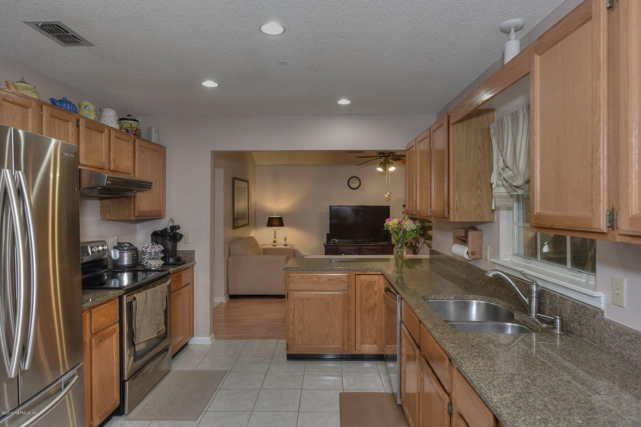 1813 Rambling Ridge Lane Jacksonville, FL 32225 - Photo 15 of 35 Kitchen and Family Room
