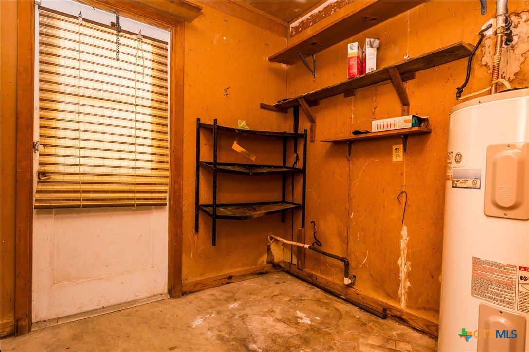 404 Rhodes Road Victoria, TX 77904 - Photo 23 of 36 a view of a room with storage