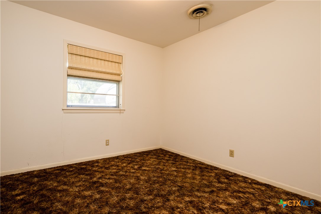 404 Rhodes Road Victoria, TX 77904 - Photo 31 of 36 a view of a room that has a window