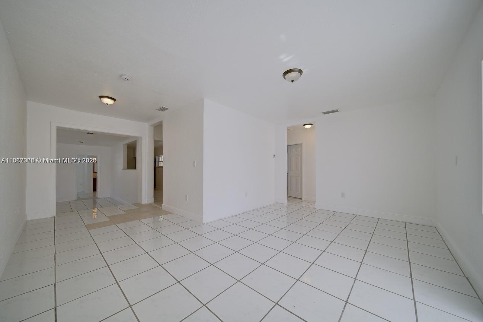 1471 Northwest 93rd Street Miami, FL 33147 - Photo 15 of 26 a view of an empty room and window