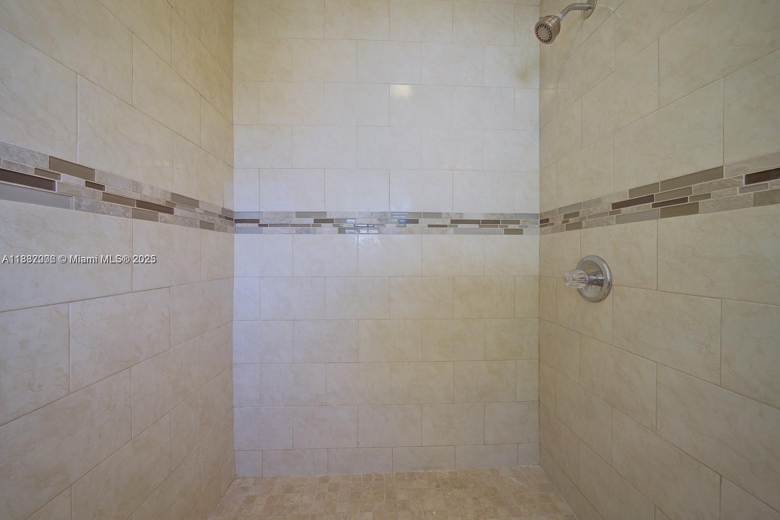 1471 Northwest 93rd Street Miami, FL 33147 - Photo 26 of 26 a bathroom with a shower