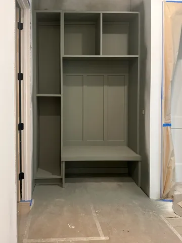 a view of a room that has a window in it