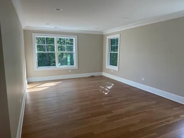 a bathroom with mirror and sink